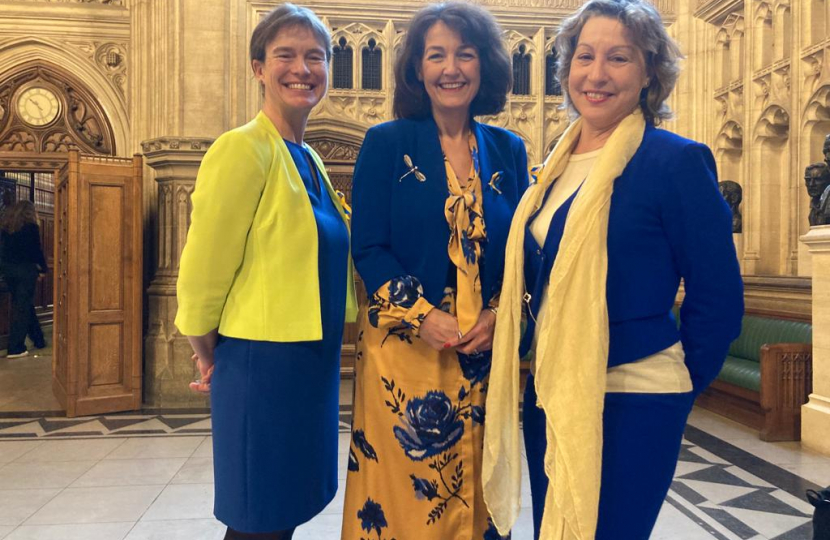 Selaine Saxby MP with Defra Ministers Jo Churchill and Rebecca Pow dressed to support Ukraine